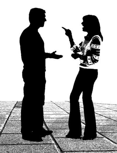 Silhouettes of man and woman having a conversation