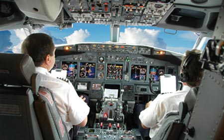 Pilots in the cockpit of a plane