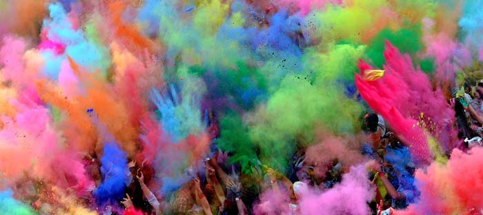 People throwing colour at Holi