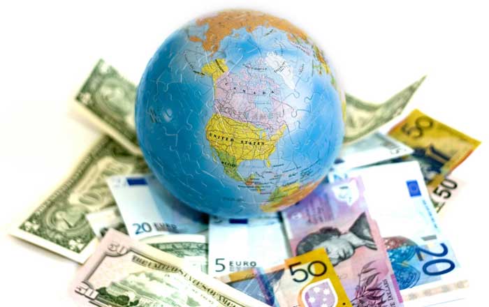 Globe surrounded by dollars and euros