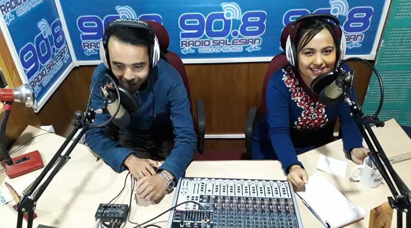 Students broadcasting from Radio Salesian studio