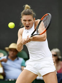 Simona Halep plays a shot at the Wimbledon Championships