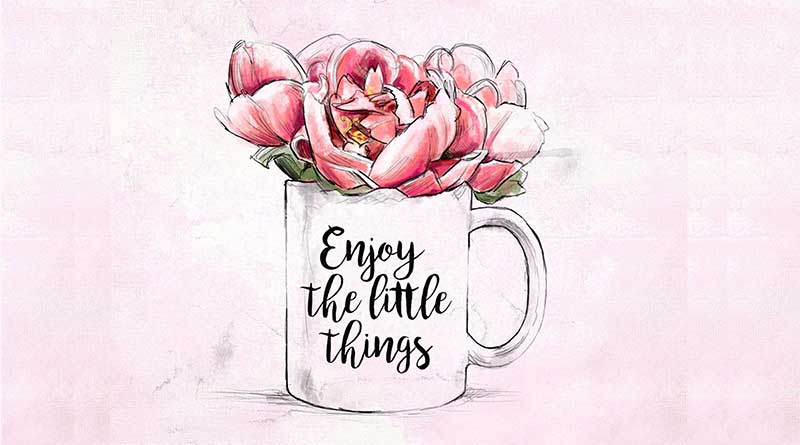 Painting of flowers in a mug with the words 'Enjoy the little things' on it