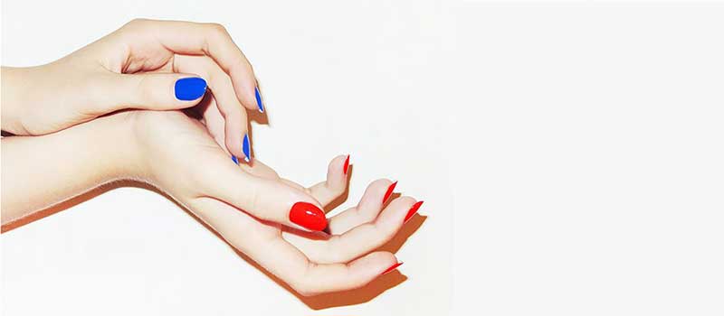 Ladies hands with coloured nails