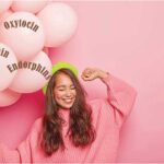 Young happy woman with pink balloons