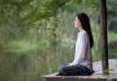 Young woman meditation outdoors in nature