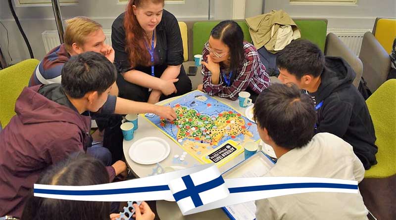 Finnish students in a discussion with a teacher