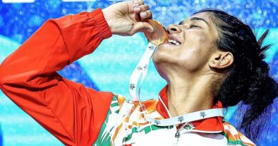 Nikhat Zareen kissing her World Boxing Championship gold medal