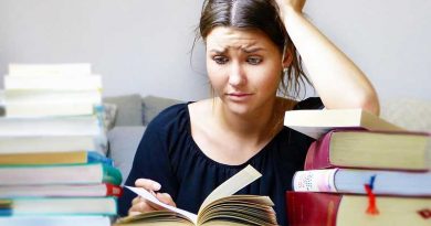Female student feeling stressed out while studying